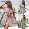 Robes décontractées à manches courtes imprimé floral mini robe pour femmes 2024 été élégant col en V arc taille élastique en mousseline de soie plage robe d'été