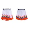 Luksusowe 2024 Nowe wysokiej jakości męskie szorty damskie Rhude Shorts Summer Fashion Beach Pants Men High Quality Street Wear Męs