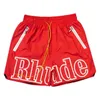 2024 дизайнерские шорты Rhude Rhude Summer High Street с буквенным принтом на шнурке 3 м Светоотражающие повседневные брюки в стиле хип-хоп Пляжные шорты Модный мужчина NFMS