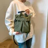 Marsupio Harajuku giapponese Abbigliamento da lavoro Borsa a tracolla per il tempo libero personale Uomo e donna Nylon Semplice Colore puro Tutto abbinato Alla moda Portatile