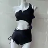 Swimsuit stroje metalowa sieć bikini bikini seksowna pusta ccity dla kobiet marka projektowa One