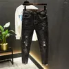Męskie dżinsy spodnie z otworami chuda ciasna rura czarna złamana kowboj