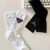 Chaussettes pour femmes, étiquette triangulaire en coton, lettre européenne brodée, Tube central, couleur unie