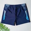 Xigegesメンズ水泳パンツはファッショナブルなゆるいゆるい快適で大きいサイズのフラットアングルプロフェッショナルクイック乾燥です