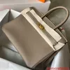 Bolsas de couro genuíno Bolsa de luxo confiável feita à mão com linha de cera embrulhada em platina Togo bezerro Litchi Padrão Bolsa feminina de couro genuíno com fivela de bloqueio com logotipo HB7I