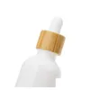 Bottiglie contagocce Bottiglie contagocce siero in vetro porcellana bianca all'ingrosso per la cura della pelle con pipetta in bambù 10 ml 15 ml 20 m Dhduj