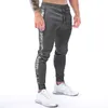 Pantalons pour hommes Hommes Coton Gym Track Pantalons de survêtement Joggers Casual Formation Stripe Entraînement Zipper Poche Fitness Mâle Courir Sport Pantalon