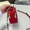 Mini sacs à bandoulière en forme de coeur en cuir rouge rose de créateur