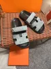 Novos sapatos de grife de sandália lâminas