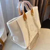 New Designer Bag Classic Tote Bag Large Capacity Handheld Bag Luxury High Quality Knitted Fashion Versatile Square Pearl Inlaid Design Luxury Bag 2024 04