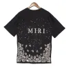 Short de créateur imprimé manches monogrammé t-shirt été t-shirt lâche luxe hommes motif hip hop t-shirt amelie hauts