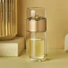 Bouteilles d'eau en verre à double paroi, couche à haute teneur en borosilicate, pour une séparation du thé mignonne et des cruches