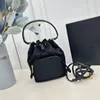 Mini borsa da uomo in nylon secchiello per donna tracolla di design moda tracolla con coulisse tracolla borsa di lusso borsa a tracolla nera estiva borsa in tela