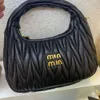 Designer Miues bags Folded Underarm Bag Paired Sheepskin Wrist Single Shoulder Crossbody Dinner Bag High Moon Teeth Bag