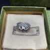 Bague de créateur de luxe pour femmes, bague en argent, bijoux classiques, styles de couple, cadeau d'anniversaire, cadeaux de mariage, grappe de fleurs dans un motif en diamant, bon