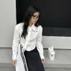 Designer camicette femminili Shirt primaverile all'inizio della primavera francese Short Elegant di alta qualità Top 3D Flower Lace Up Vestiti ricamati