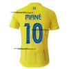 2023 2024 Al Nassr Futebol Jerseys Ronaldo Fãs Jogador Home 23 24 Brozovic Ghareeb Talisca Telles MashariPov Lami Mulheres Homens Crianças Camisa de Futebol Al-Nassr FC