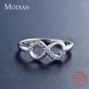 Klusterringar modian 2024 mode mobius design smycken solid 925 sterling silver ring med tydlig kubik zirkoniet klassisk bröllop kvinnlig