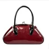 Designer Luxury Fashion Tote Sacs Internet Famous Pearl Handbag pour femmes NEW NICHE Design Crossbody Bag Mini Lipstick Bag Carry and Change Wallet M0