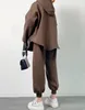 Dwuczęściowe spodnie damskie spodni z kapturem z kapturem z długim rękawem i sport ustawił najnowszą modę sprzedając unikalny projekt odzieży
