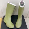 Nouvelles bottes de mode chaussures de créateurs haut de gamme bottes de pluie antidérapantes en plein air chaussures en caoutchouc mi-longues pour femmes chaussures de gelée de bonbons bottes de moto chaudes bottes martin chaussures d'intérieur