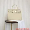 Äkta läderväskor Trusted Luxury Handbag 2024 European Vintage New Women's Bag Handbag Oblique Straddle Bag Utsökt Platinum Bag Hbk30 med logotyp HBTY