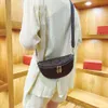 Kvinnors 2023 Summer New Fashion Wide Strap Single Shoulder Populära kontrast Färgstruktur liten underarm Crossbody Bag 75% Factory Direct Sales