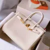 Bolsas de couro genuíno Bolsa de luxo confiável feita à mão com linha de cera embrulhada em platina Togo bezerro Litchi Padrão Bolsa feminina de couro genuíno com fivela de bloqueio com logotipo HB7I