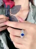 Anéis de cluster 925 prata esterlina ovo em forma de anel de tesouro azul conjunto com diamantes de alto carbono design elegante versátil para mulheres