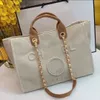 New Designer Bag Classic Tote Bag Large Capacity Handheld Bag Luxury High Quality Knitted Fashion Versatile Square Pearl Inlaid Design Luxury Bag 2024 05