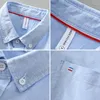 Camicie casual da uomo 2024 Camicia Oxford a maniche lunghe primaverili Tasca sul petto applicata sul davanti Colletto abbottonato vestibilità regolare Lavoro spesso