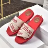 Designerskie kobiety tkane rzymskie sandały z płaskim dno kapcie wielokolorowe koronkowe litery na płótnie kapcie letnie buty domowe luksusowe piaski