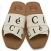 Pantofole firmate Sandali Woody tessuto Tela Lettere Marchio di lusso diapositive sandali piatti Comodi trendy Alla moda con punta aperta 002