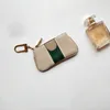 302 Nyckelväska läder plånbok mode kvinnor mens keyringbag hållare mynt handväska lyxdesigner canvas guldknappar mini plånböcker charmiga tillbehör med låda