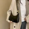 Chaîne de style français 2023 Nouveau automne hiver à la mode Crescent Dumpling Sac à bandoulière de tempérament décontracté et tendance 75% ventes directes d'usine