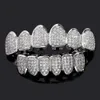 HipHop Bling glacé CZ dents chapeau ensemble haut et bas cubique Zircon or argent couleur dents mat chapeau 240220