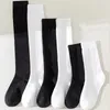 Chaussettes en Nylon Sexy pour femmes, mignonnes JK Lolita, noires et blanches, longues au dessus du genou, cuisses, chaussettes à haute Compression