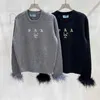 Maglioni da donna Designer Moda Donna Autunno/Inverno Nuovo semplice lettera Piuma Jacquard girocollo maglione lavorato a maglia 8PGU