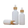 Bouteilles compte-gouttes en gros bouteilles d'huile essentielle en verre de porcelaine blanche flacon compte-gouttes de sérum de soin de la peau avec pipette en bambou 10 ml 15 ml 20 M Dhduj