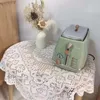 Caxe de dentelle à table en nappe
