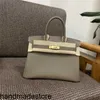 Borsa tote BK Cucita a mano con filo di cera color miele Home Togo Pelle di vitello Borsa a mano con fibbia in pelle grigio elefante