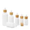 Bouteilles compte-gouttes en gros bouteilles d'huile essentielle en verre de porcelaine blanche flacon compte-gouttes de sérum de soin de la peau avec pipette en bambou 10 ml 15 ml 20 M Dhduj