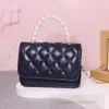 Moda dziewcząt Pearls łańcuch torebki Ins Kids Diamond Knitce Połączona torba na pojedyncze ramię w stylu dzieci Crossbody Mini torby S1083