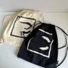 New Canvas Makeup Bag Women's Letter Printed Shoulder Messenger Bag Mid-Ancient Retro Drawstring Bucket Backpack