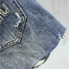 Vårkvinnors shorts modebrev broderi nödställda tvättade denim designer byxor kvinnor blå a-line het