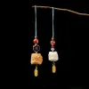 Pendants Natural Sandalwood Carving Lion Wake Vintage Small Pendant Wen Play Ivory Fruit Mobile Phonelanyard Wooden Mobile Phone Chain