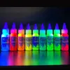 Kits 8 Farben Fluoreszenz Tattoo Tinte für Körperkunst Helle Mode Party Lila Licht Bestrahlung Pigment Farbe Tattoo Tinte Liefert