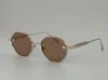 Nieuwe luxe merkontwerpzonnebril voor dames 122 zeshoek ovale vorm dame Vrouwelijke vintage trandy tinten mode metalen vrouw zonnebril high-end bril uv 400 lens