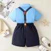 Kledingsets 2 stuks babyjongenskleding casual schattig korte mouw strikje shirt jarretel shorts set kleding lente en zomer voor babyjongen