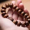 Strand Hua Li Mu Abacus pärlor som snider sex karaktär True Words Buddha Handstring Plate Spela Single Circle Wood Armband